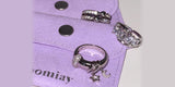 Oomiay rings on branded pouches