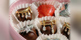 Oomiay rings in a heart-shaped box of chocolates