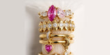 A tall stack of colorful Oomiay rings