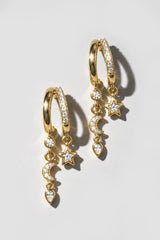 Gold Prism Earrings. Pavé double hoop with a crescent moon drop and a 4mm bezel star charm