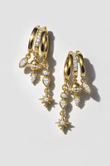 Gold Vesper Dangle Earrings. Stacked hoops with planet, marquise, pear and starburst crystal charms