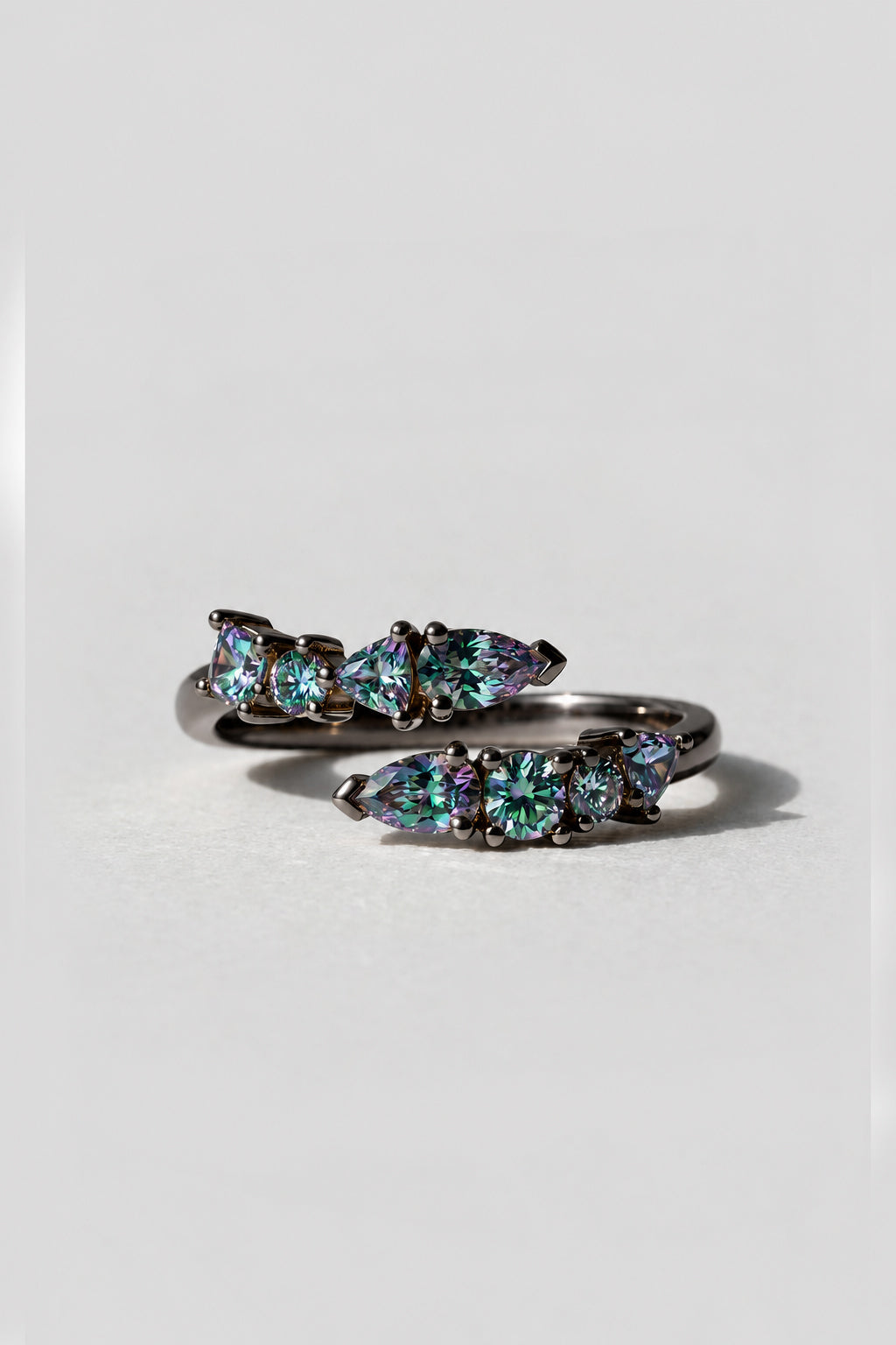 Serpent Black Gold open gap ring with mixed shape mystic topaz stones