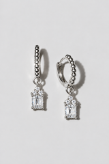 Silver Emerald Cut Huggies. Beaded huggie with a 5x7mm emerald cut white crystal charm under a three-crystal cap