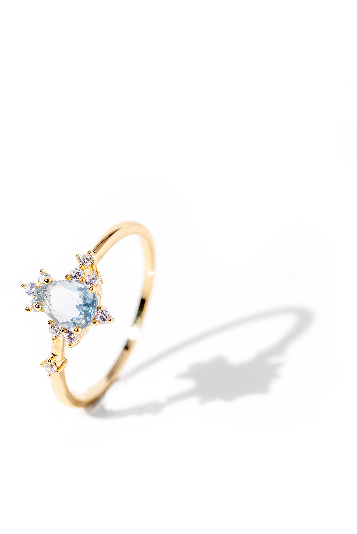 Gold Ring Featuring a Light Blue Crystal Earl Grey by OomiayN N 